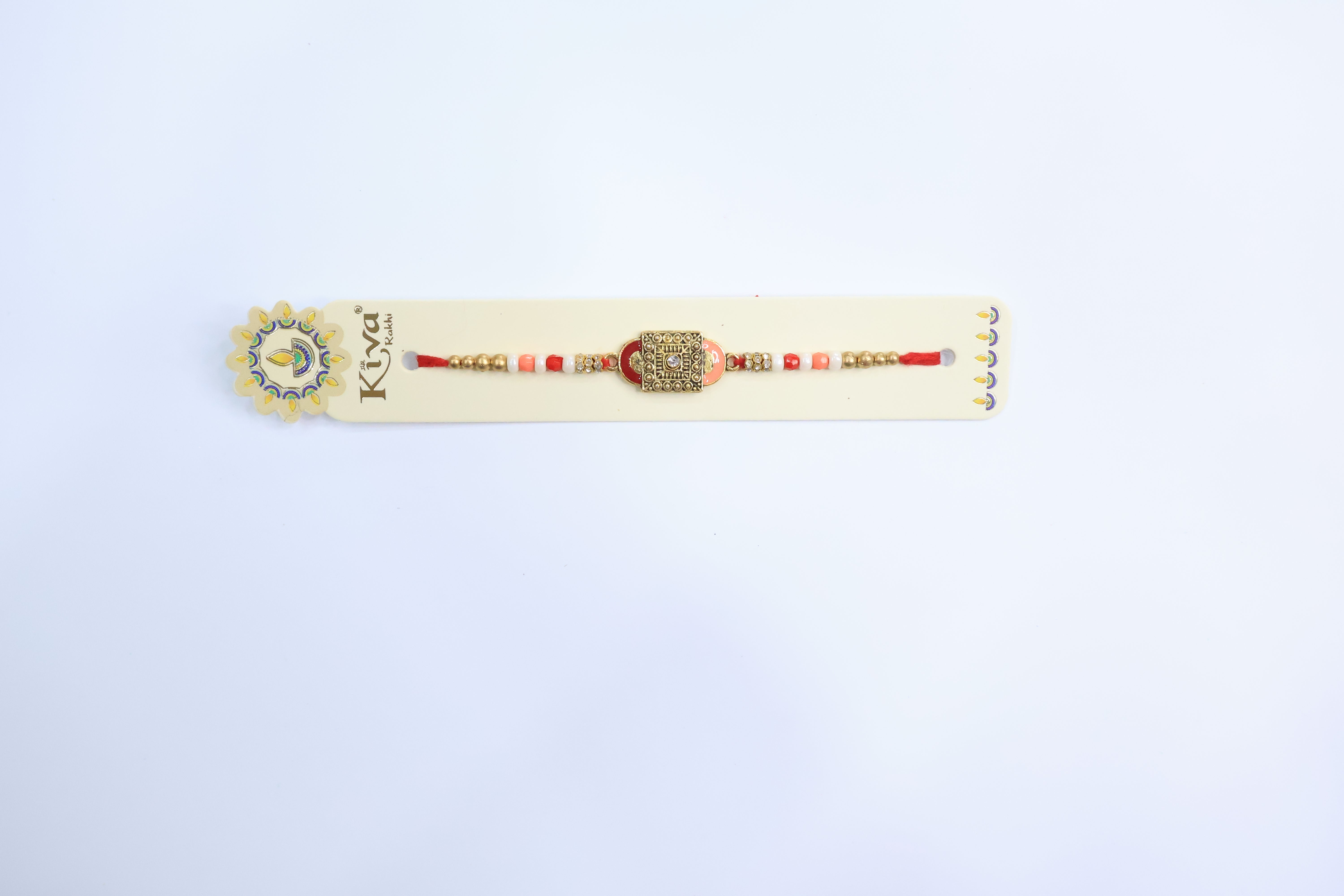 Antique Gold & Red Rectangular Rakhi with Beaded Accents
