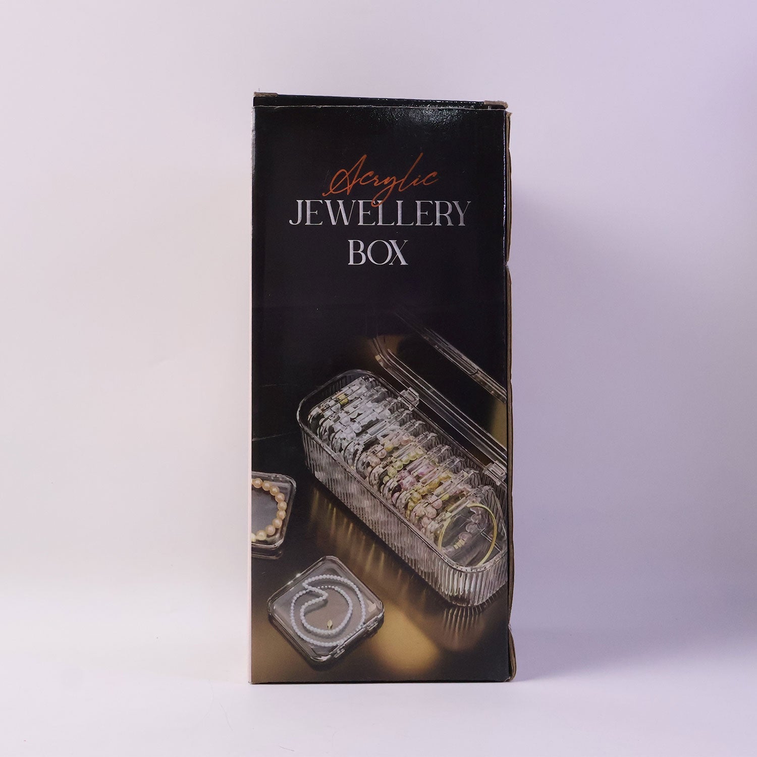 Transparent acrylic jewelry box with lid, perfect for home and travel storage.