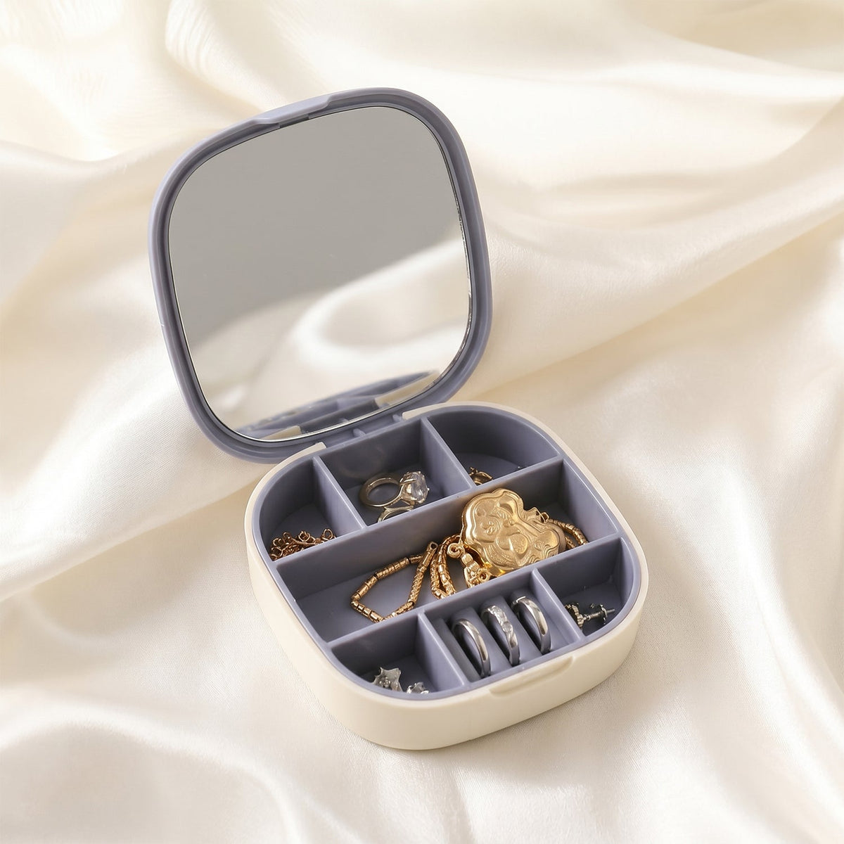 Jewelry Storage Box with multiple compartments and built-in mirror