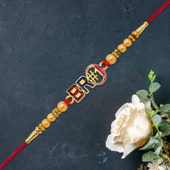Bro #1 Rakhi with Golden Beads & Enamel Finish