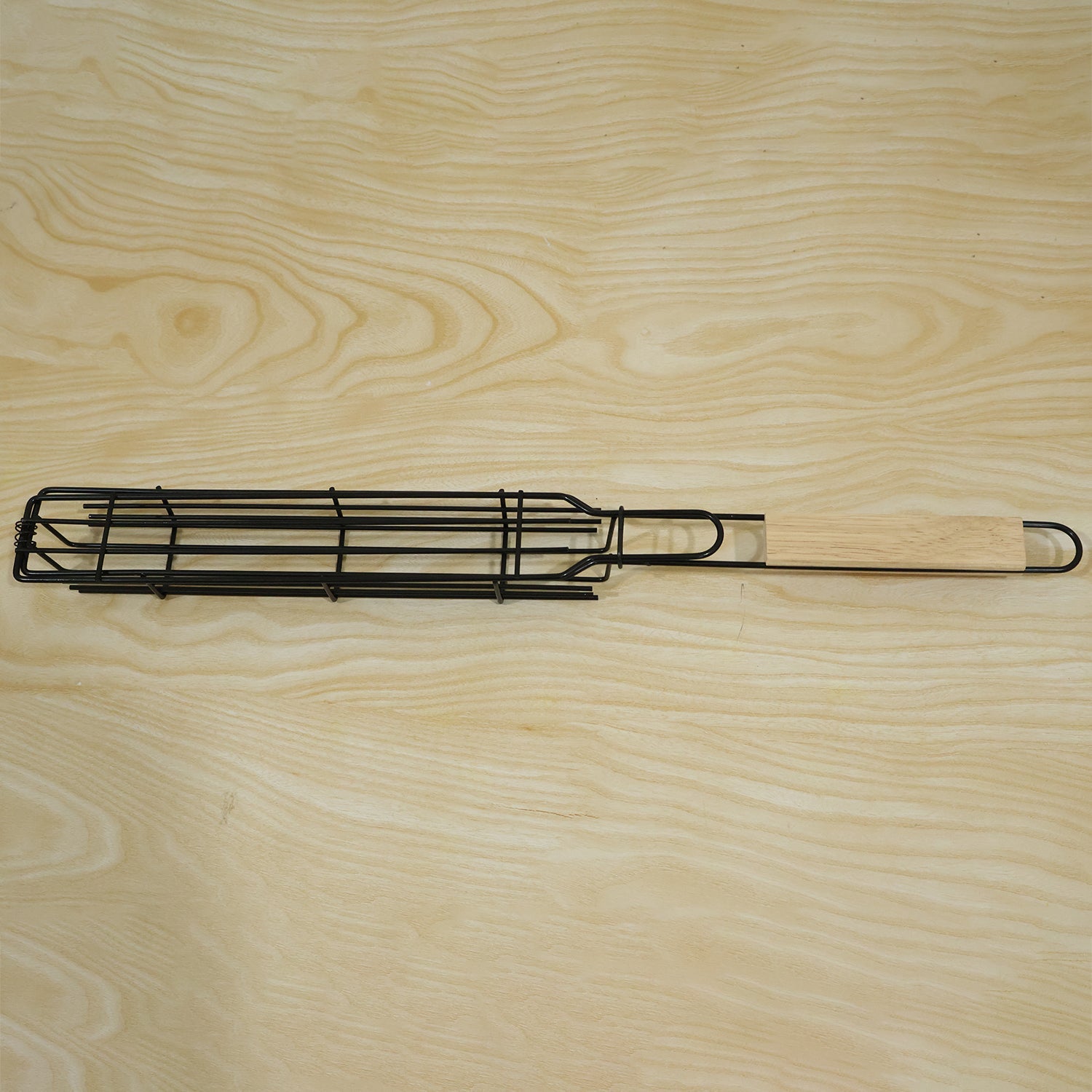 Live photo of metal barbecue grill basket