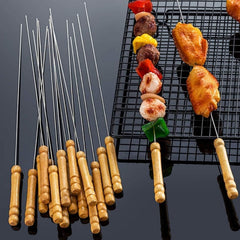 Pack of 12 stainless steel barbecue skewers with wooden handles