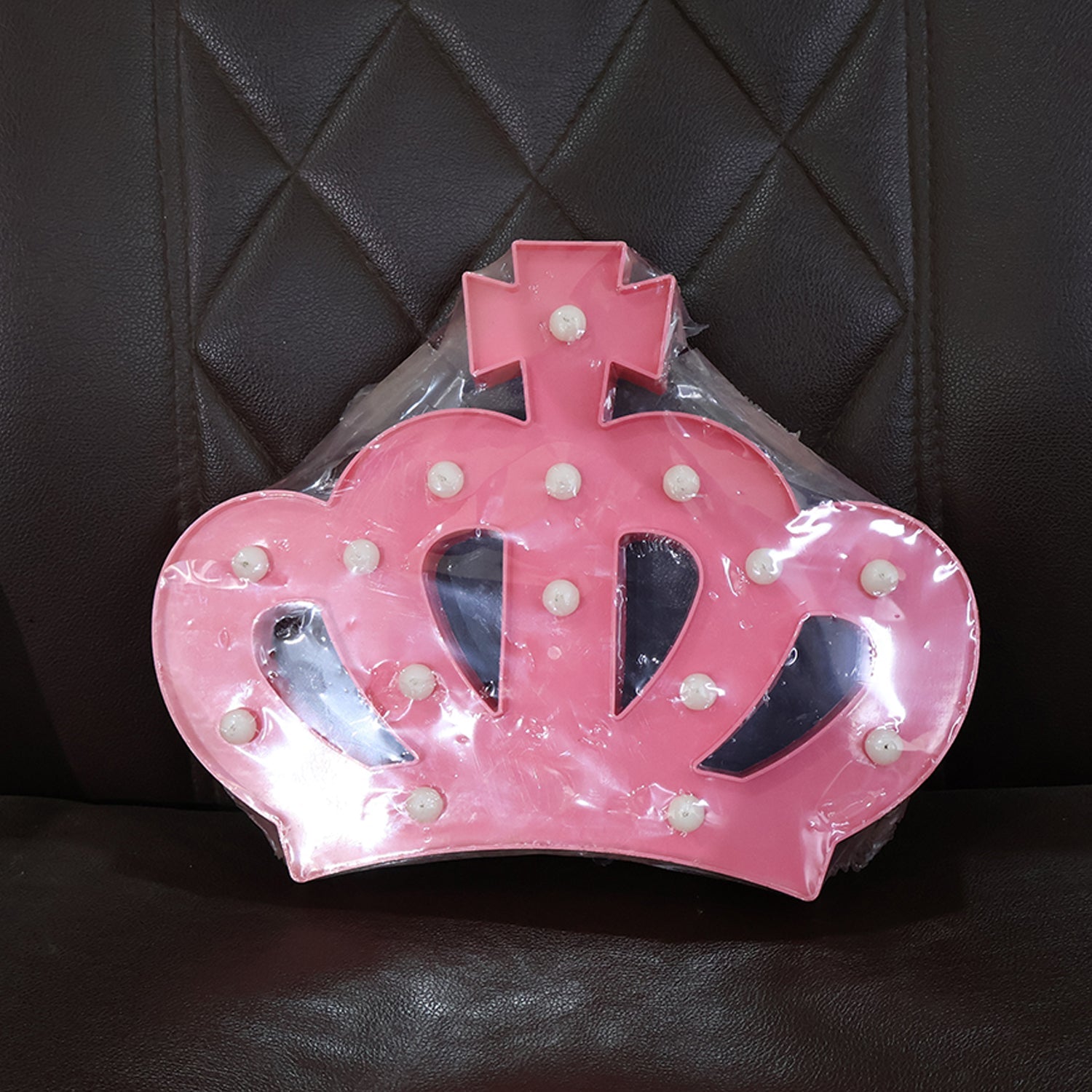 Crown LED light displayed on a shelf