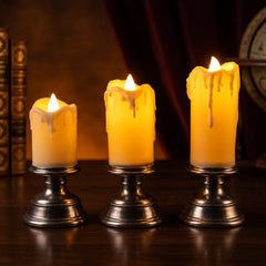 Flameless candles glowing on a decorated table