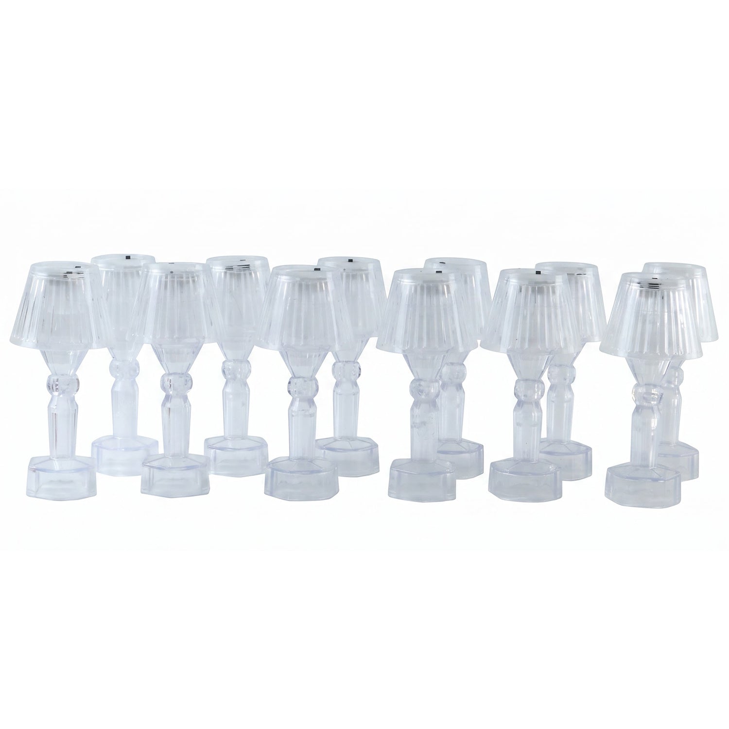 Twelve identical clear acrylic miniature table lamps with ribbed shades and hexagonal bases, displayed on a white background.