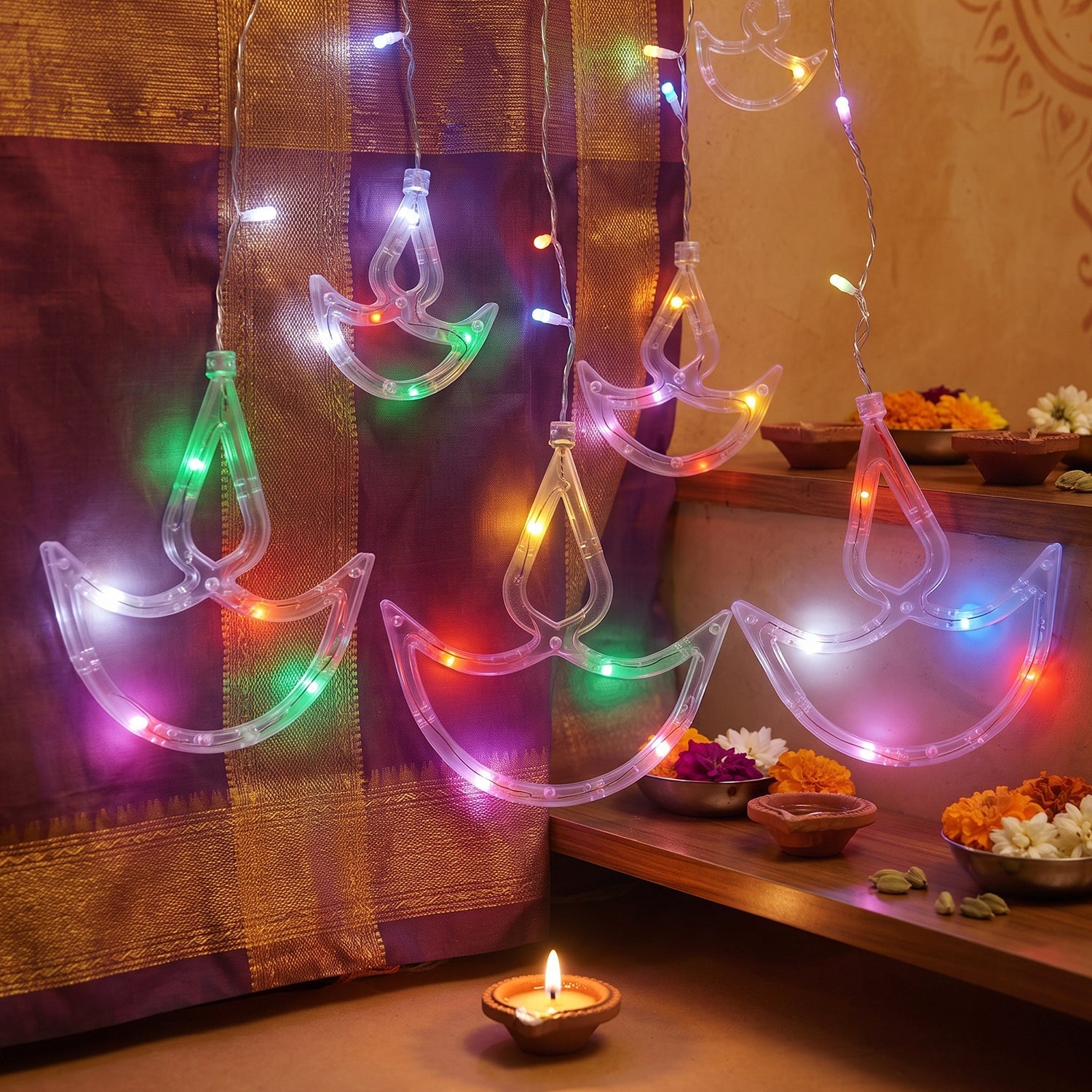 Diya lights decorating a doorway for Diwali