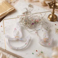 Diya string lights hung as a festive curtain