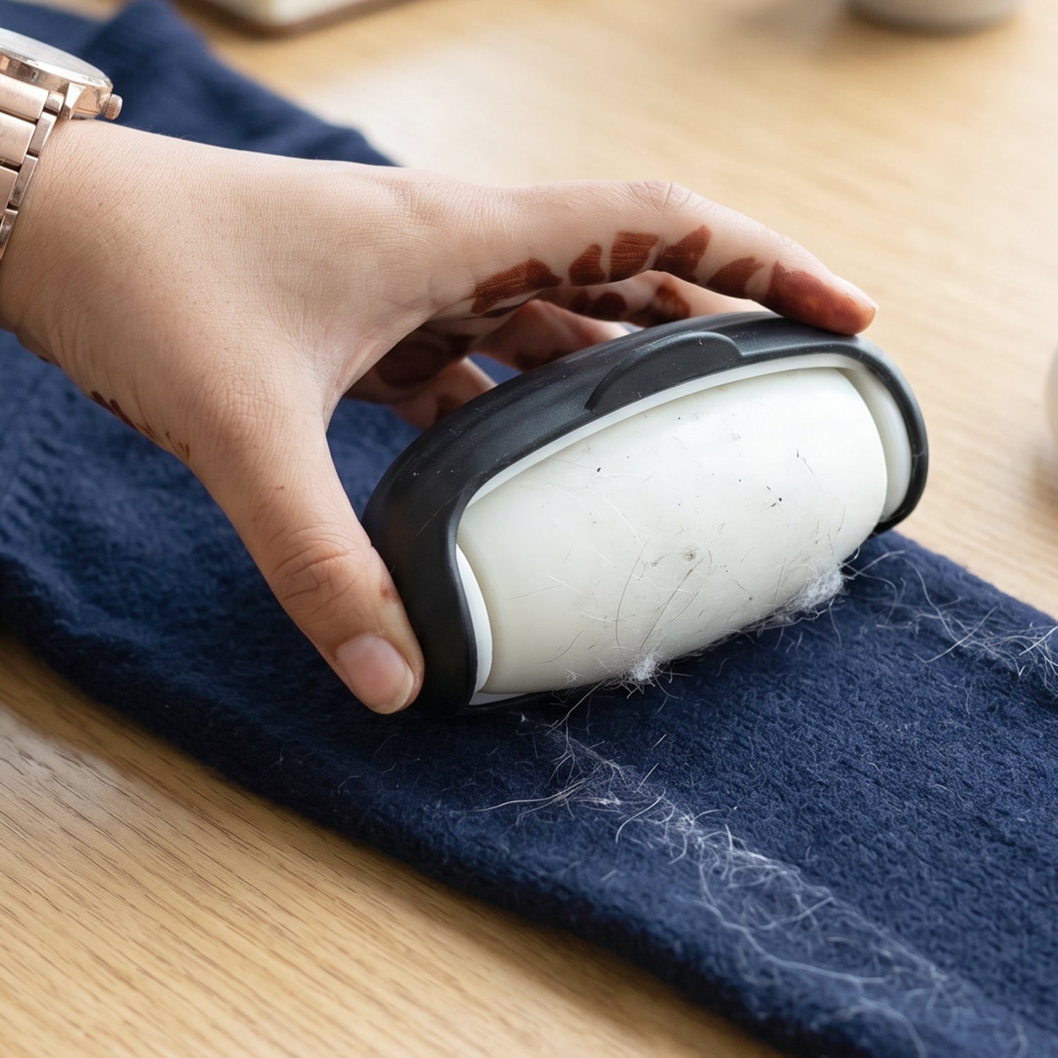 Penguin reusable lint roller on fabric