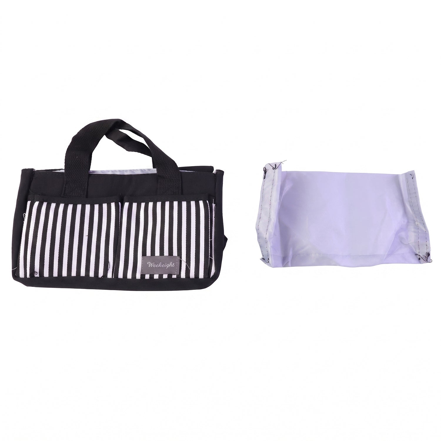 A black and white striped organizer bag caddy with handles is shown next to a gray fabric divider on a white background.