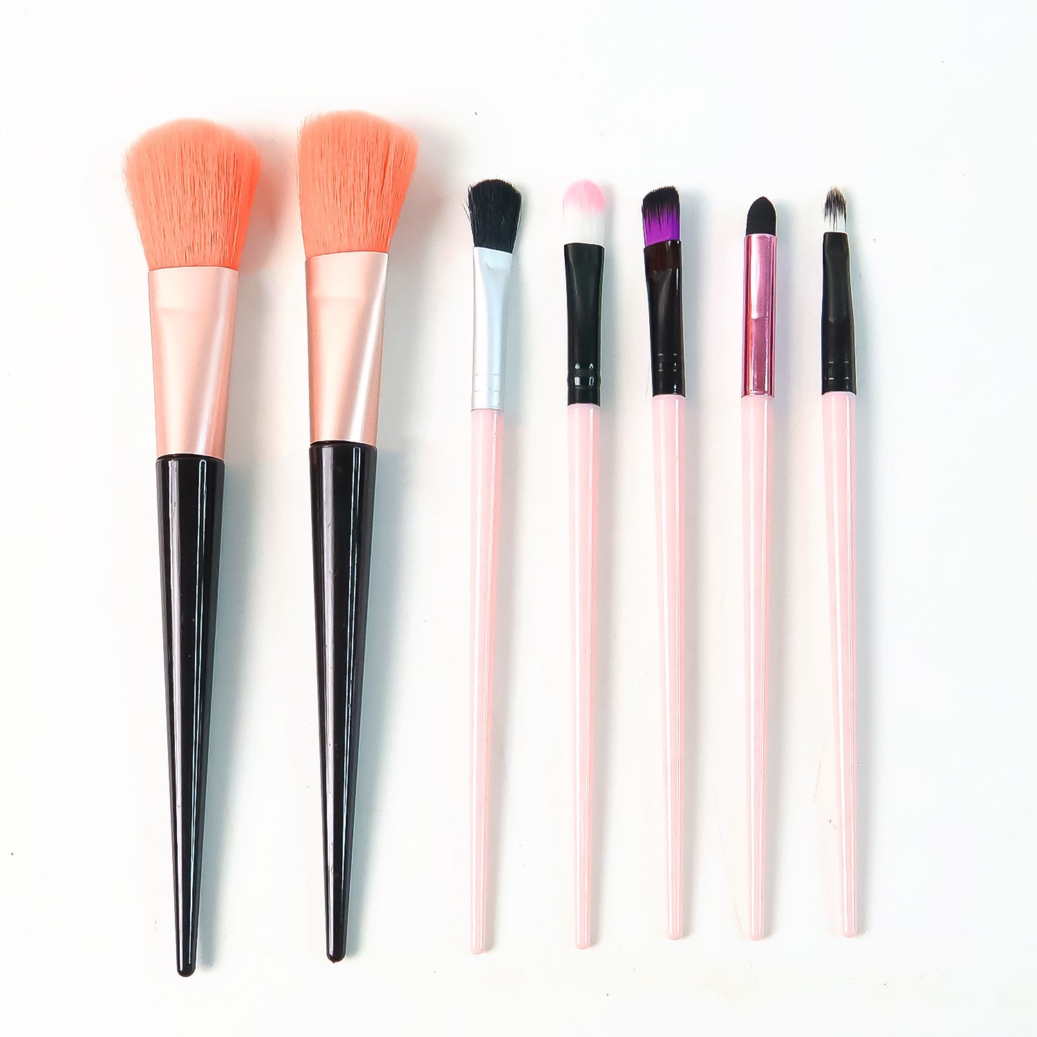 Cosmetic brush set with ergonomic handles