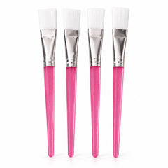 Four identical face mask brushes with white bristles, silver ferrules, and translucent pink handles stand upright.