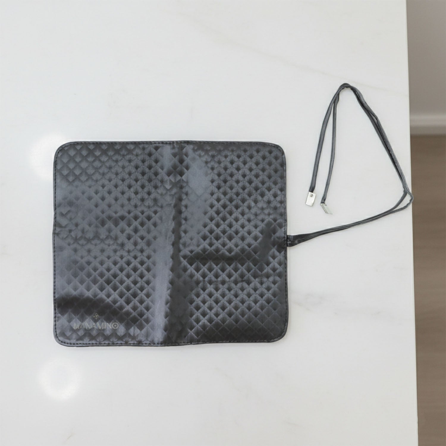 Inside view of foldable makeup brush organizer pouch
