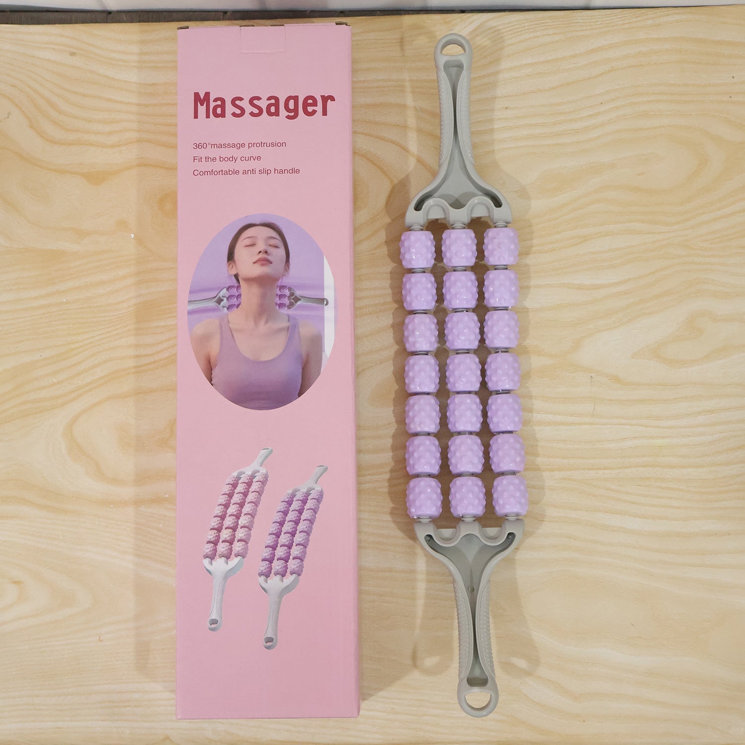 Live photo of handheld muscle roller massage stick
