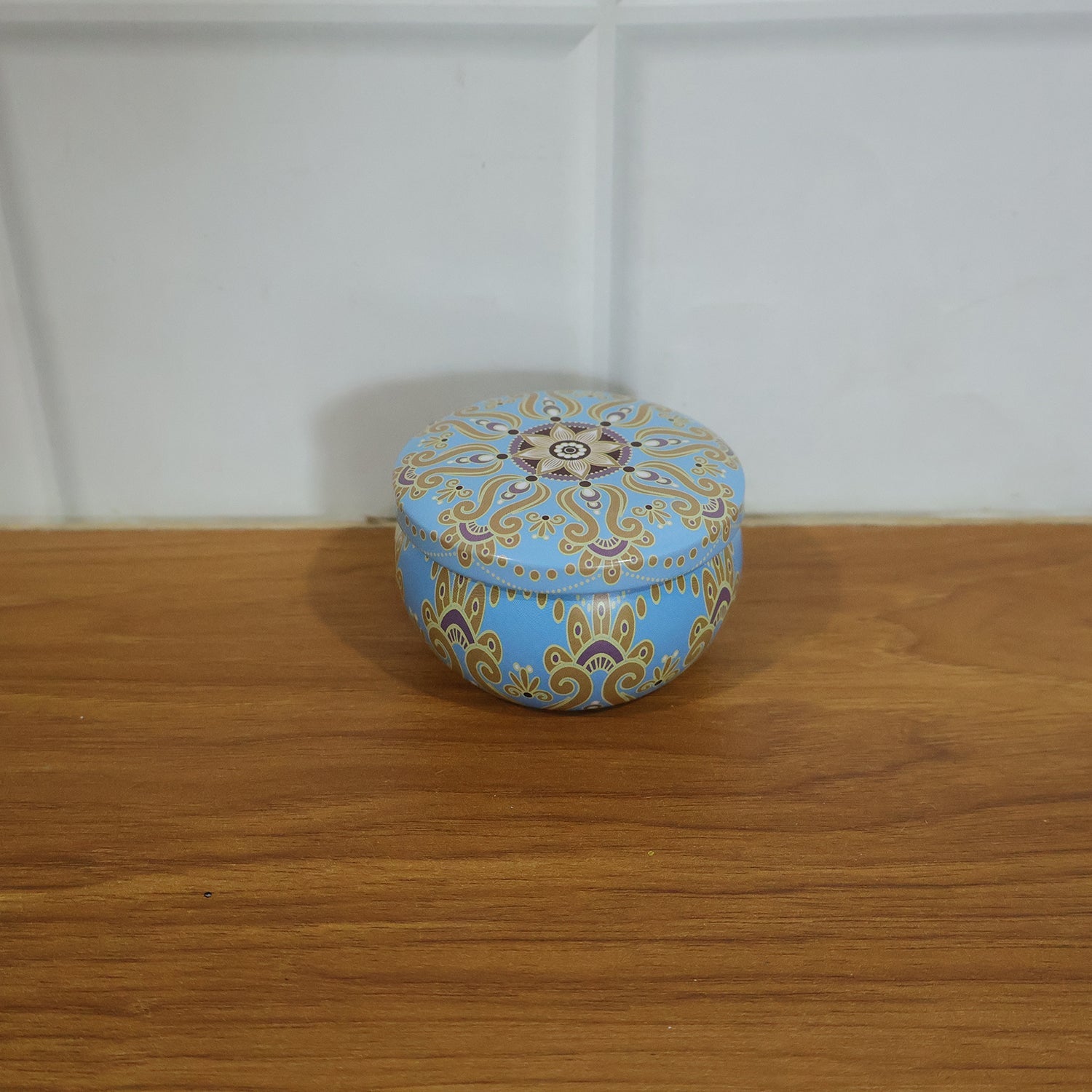 Mandala printed metal candle tin in home dÃ©cor setting