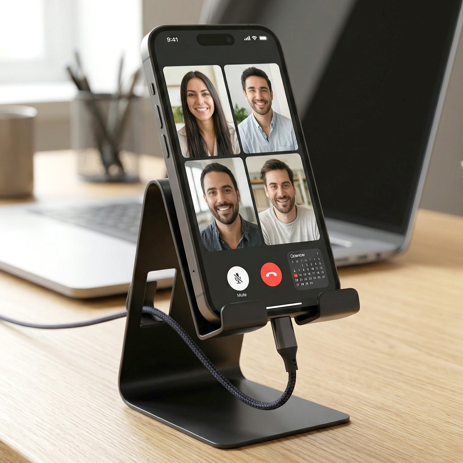 Black metal stand holding mobile phone, compact design