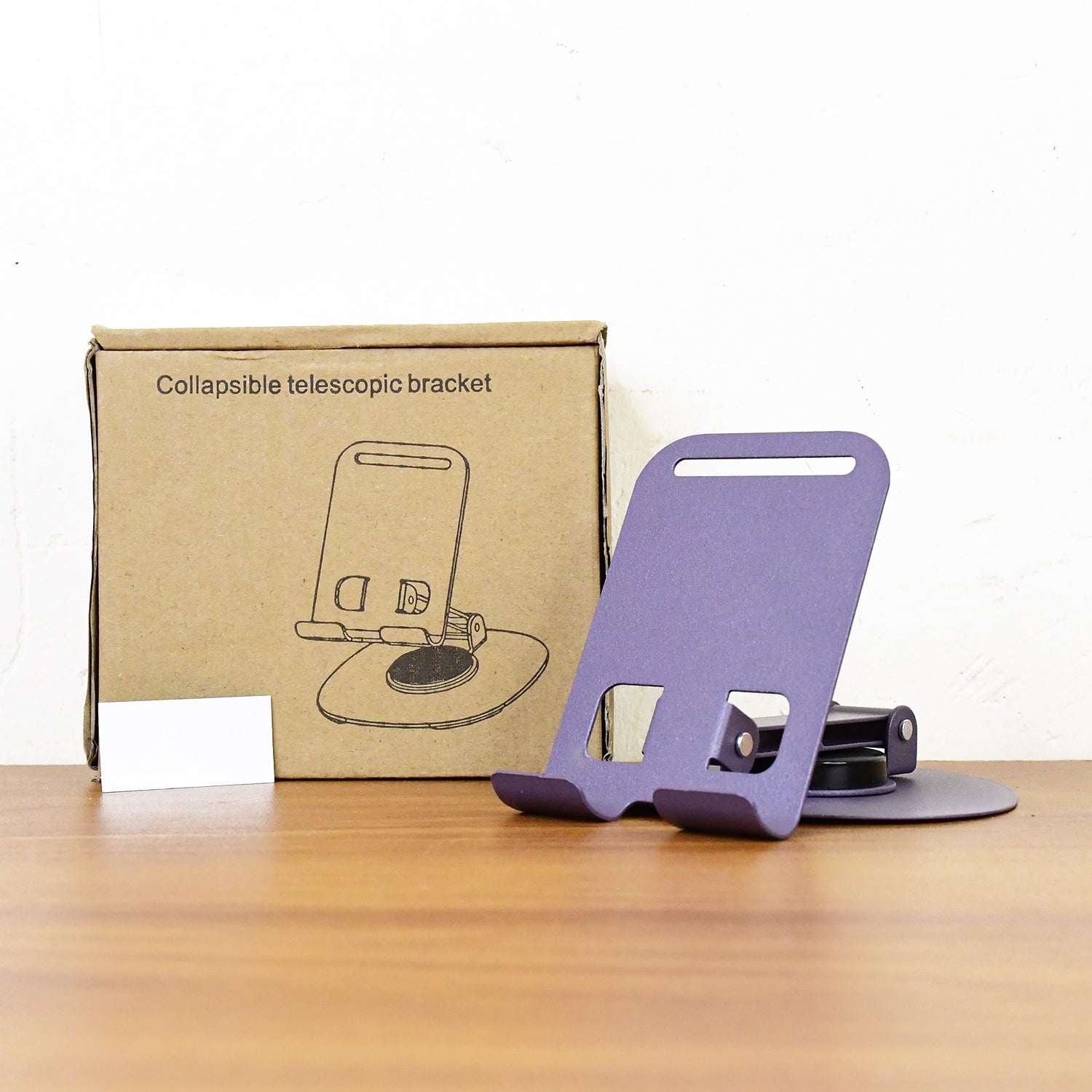 Live image of phone held securely by foldable mobile stand