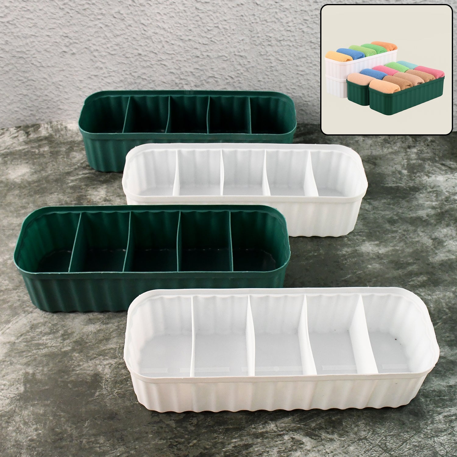 Four 5-compartment drawer organizers stacked with various items like socks and underwear