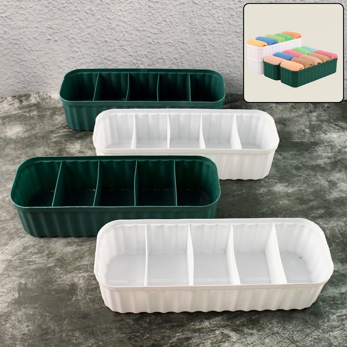 Four 5-compartment drawer organizers stacked with various items like socks and underwear