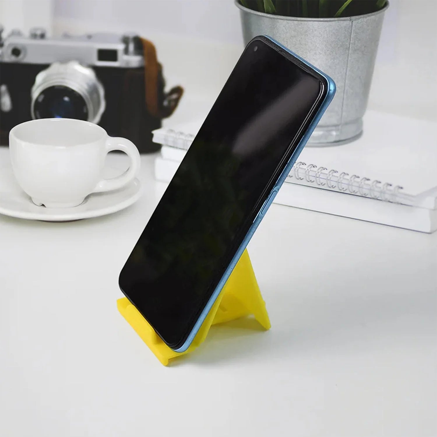 Foldable Plastic Phone Stand in Use