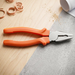 Close-up of combination pliers showing serrated gripping surface and built-in wire cutter