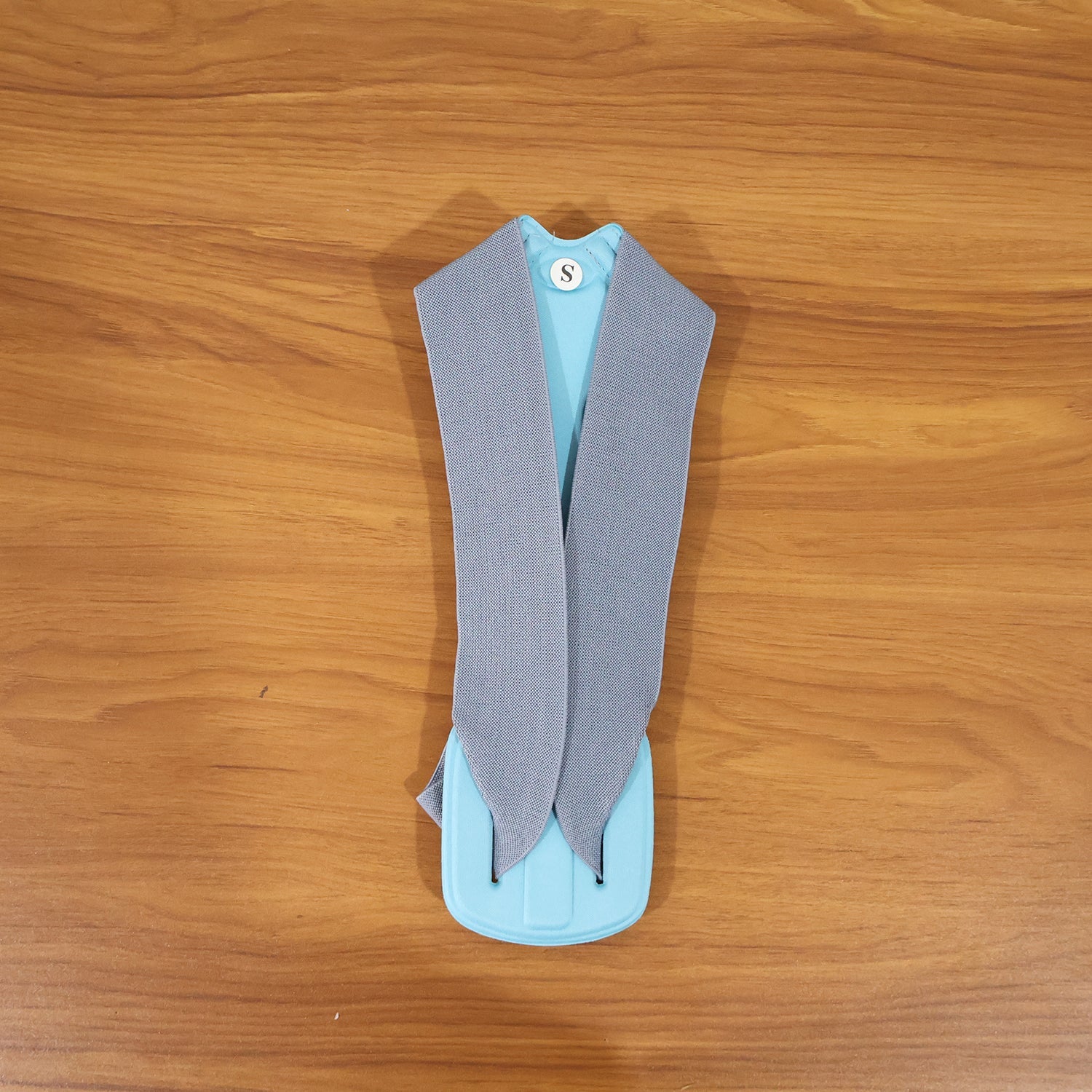 Posture corrector worn by model