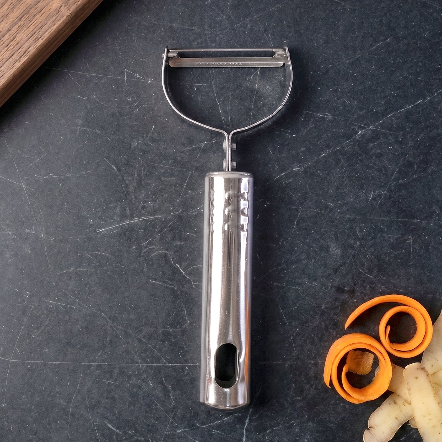 Vegetable peeler tool on white background