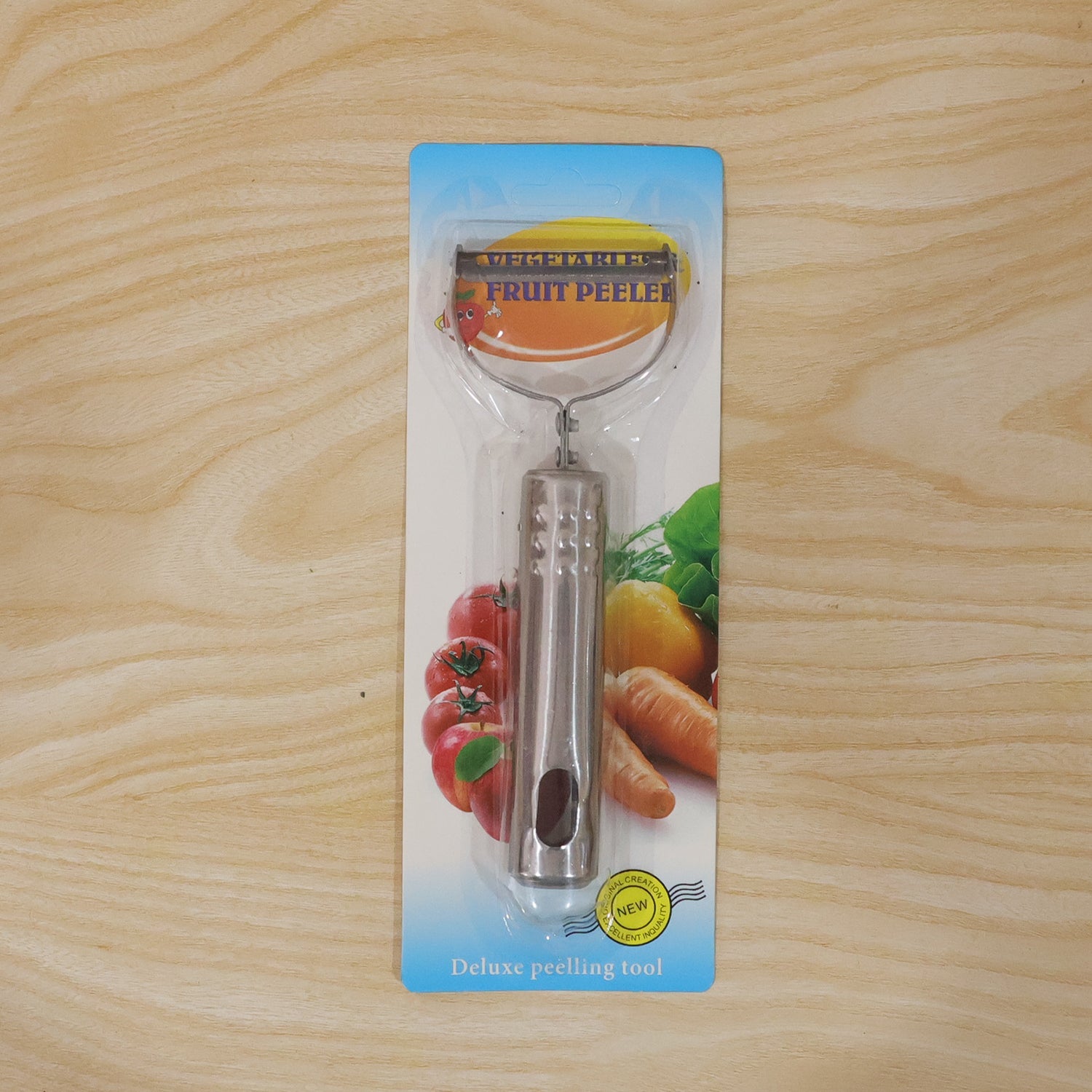 Compact stainless steel vegetable peeler