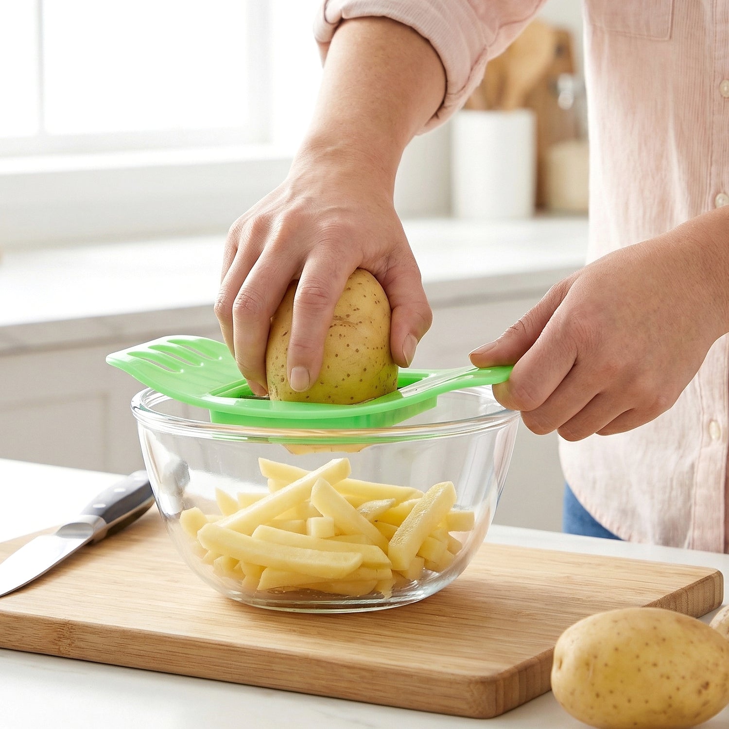 Indo Glow potato cutter demonstrating easy slicing