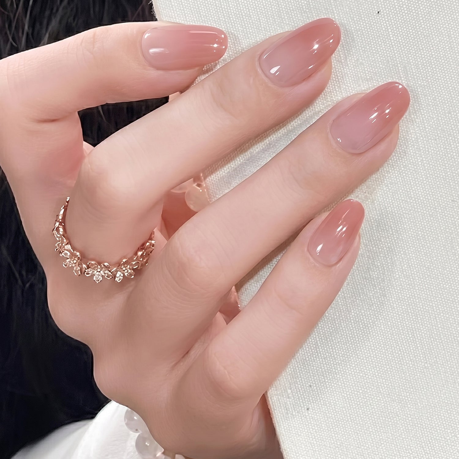 Application of artificial nail tips on natural nails for a French manicure