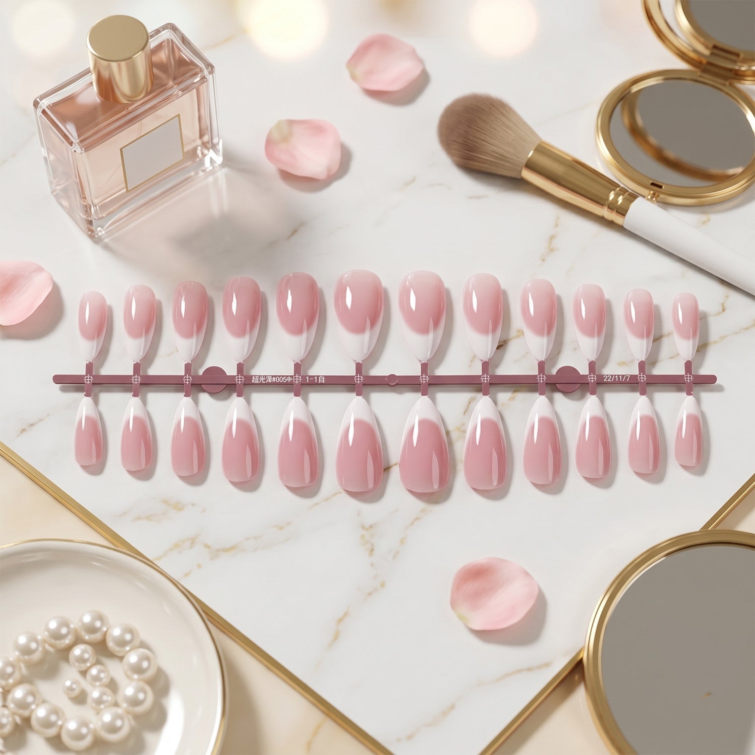 Set of artificial nail tips with white tips and pink base