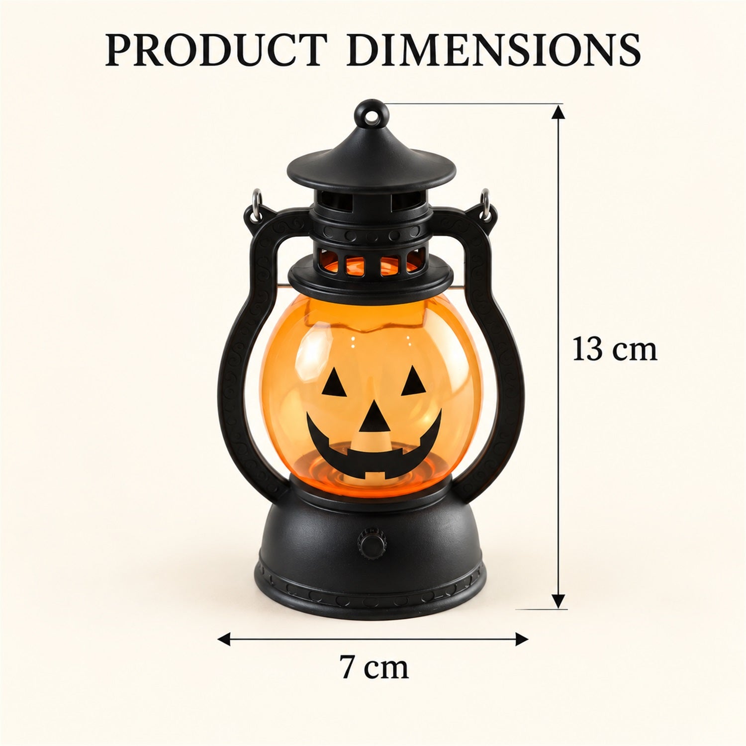 A pumpkin lantern with a smiling face is shown with its dimensions: 13 cm tall and 7 cm wide.