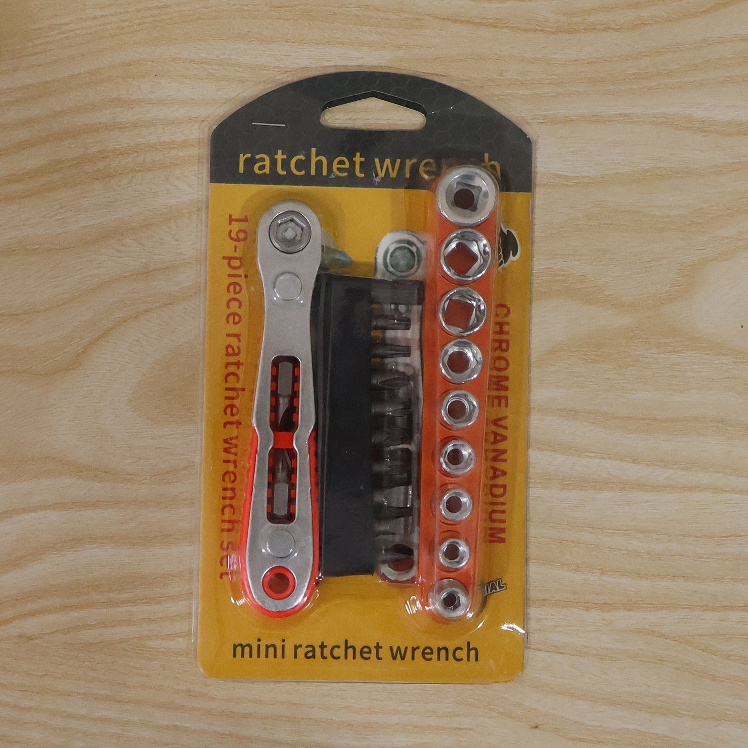 Mini ratchet wrench kit with various attachments displayed