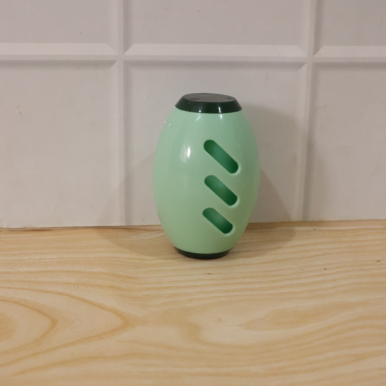 Hand demonstrating reusable lint roller effectively cleaning a surface