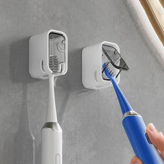 Close-up of open slot for water drainage on toothbrush holder