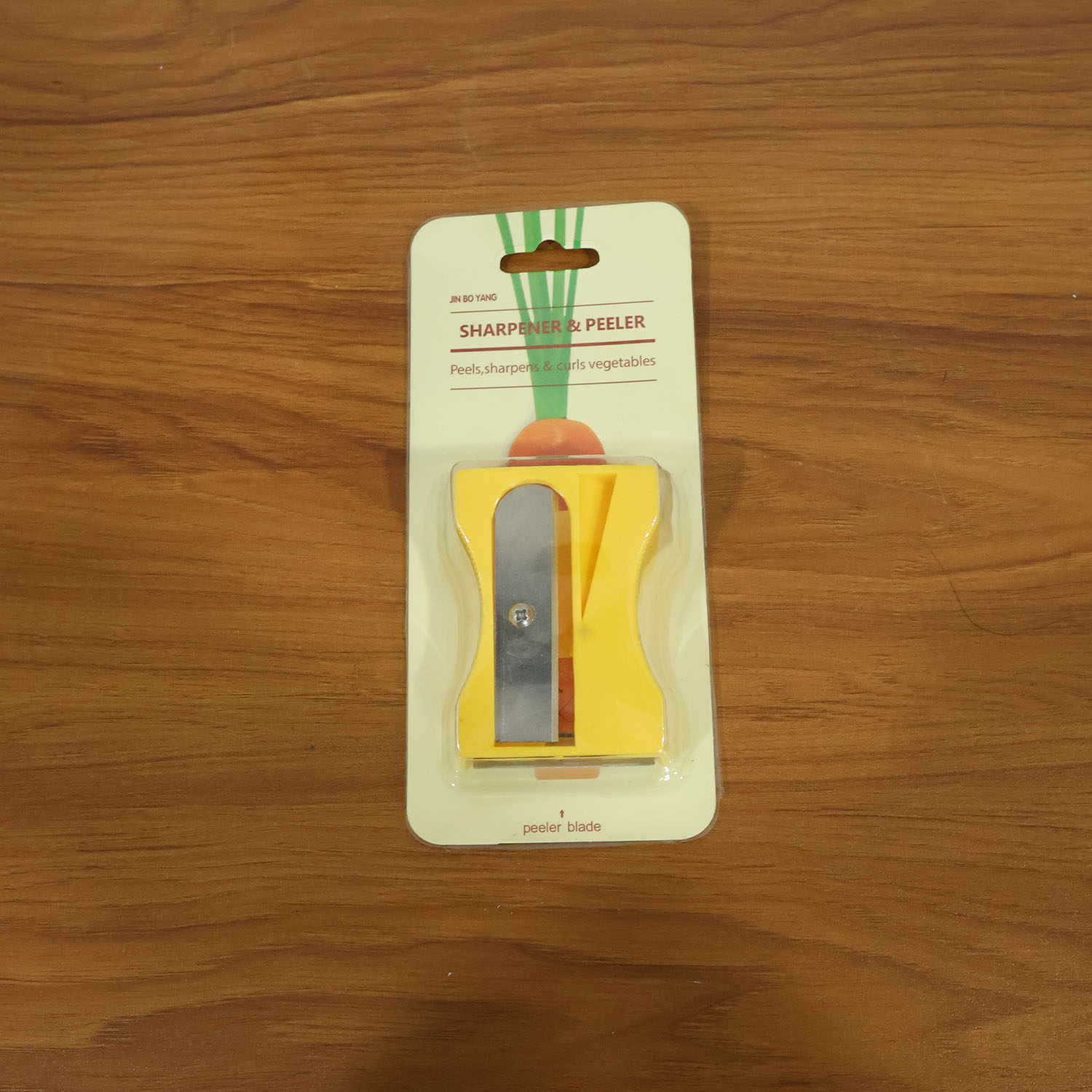 Vegetable sharpener and peeler tool in kitchen setting