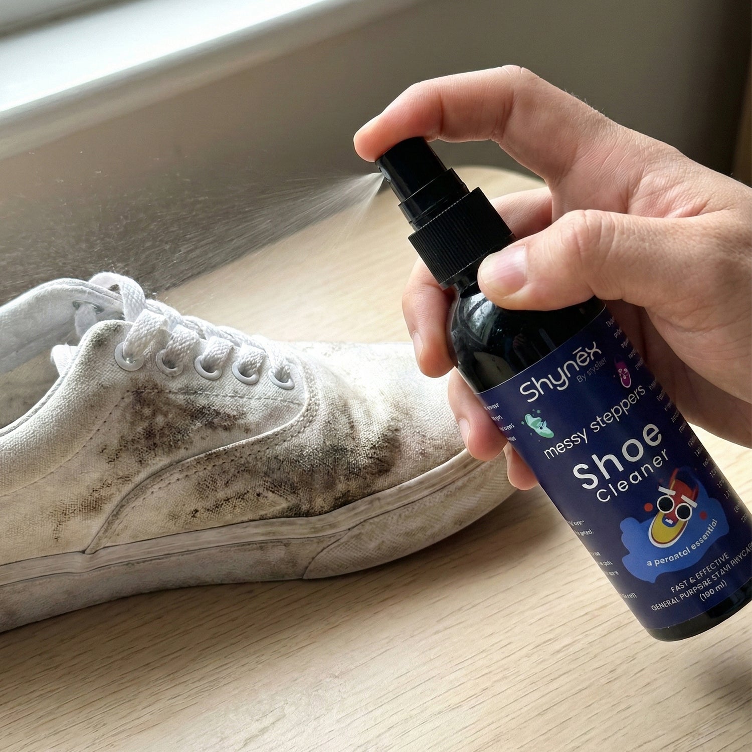 Messy Steppers Shoe Cleaner Spray used on white sneakers
