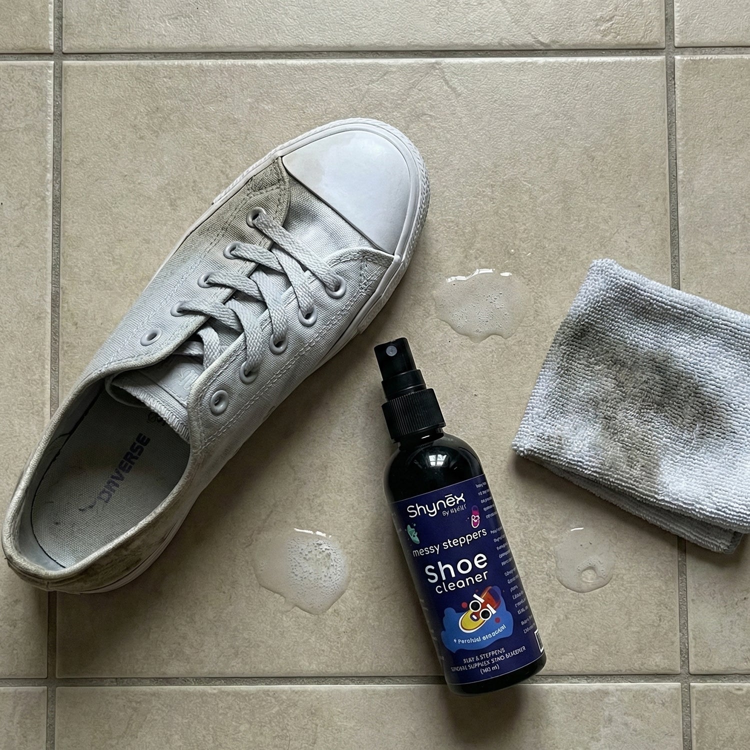 Messy Steppers Shoe Cleaner Spray bottle with shoes