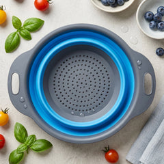 Silicone foldable strainer in use for washing vegetables.