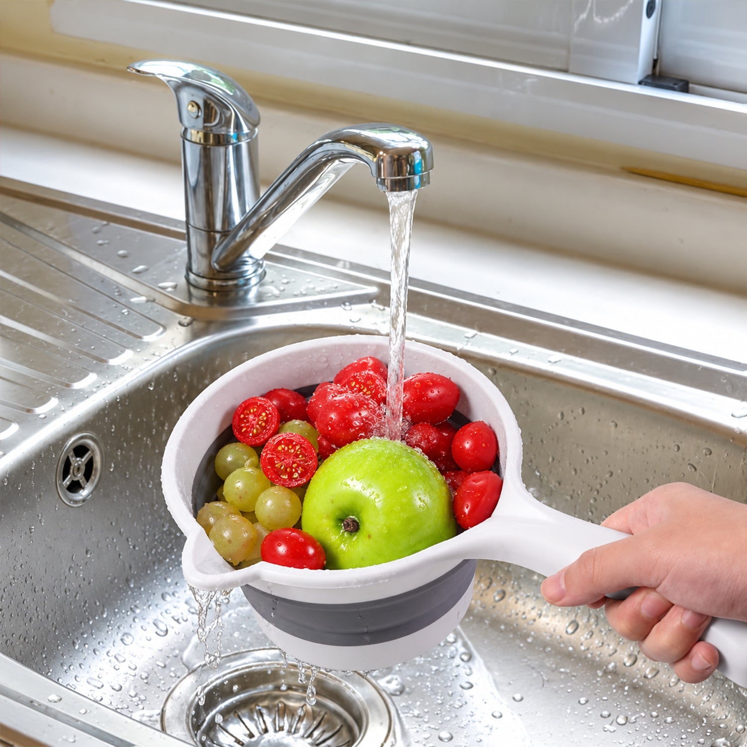 Collapsible water scoop with long handle.