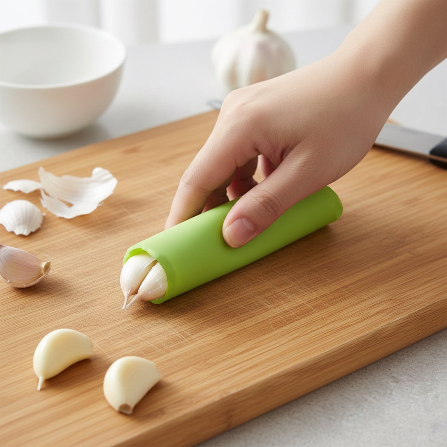Garlic cloves inside silicone garlic peeler tube