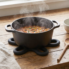 Hot pan resting on the silicone trivet mat