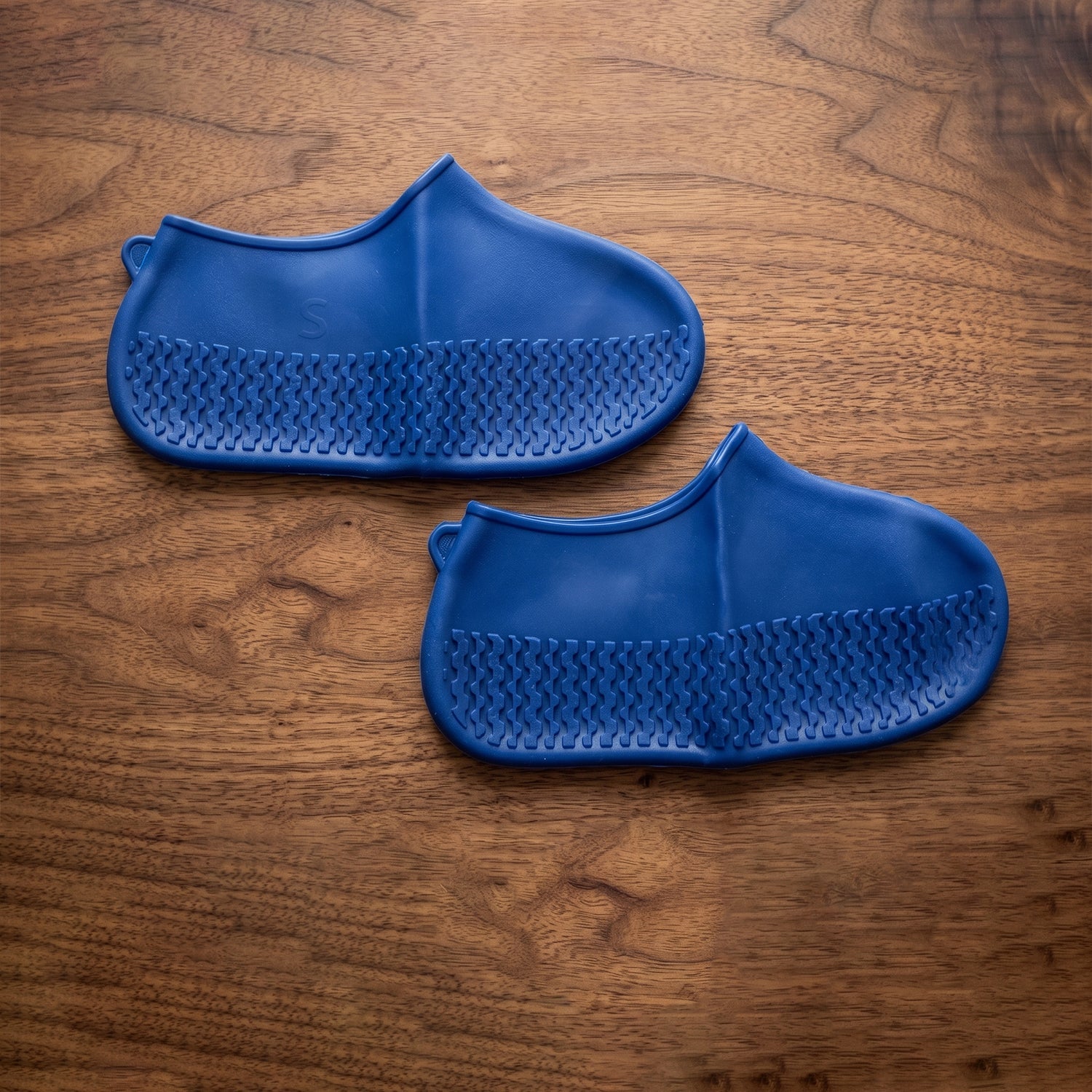 Blue shoe cover white bg