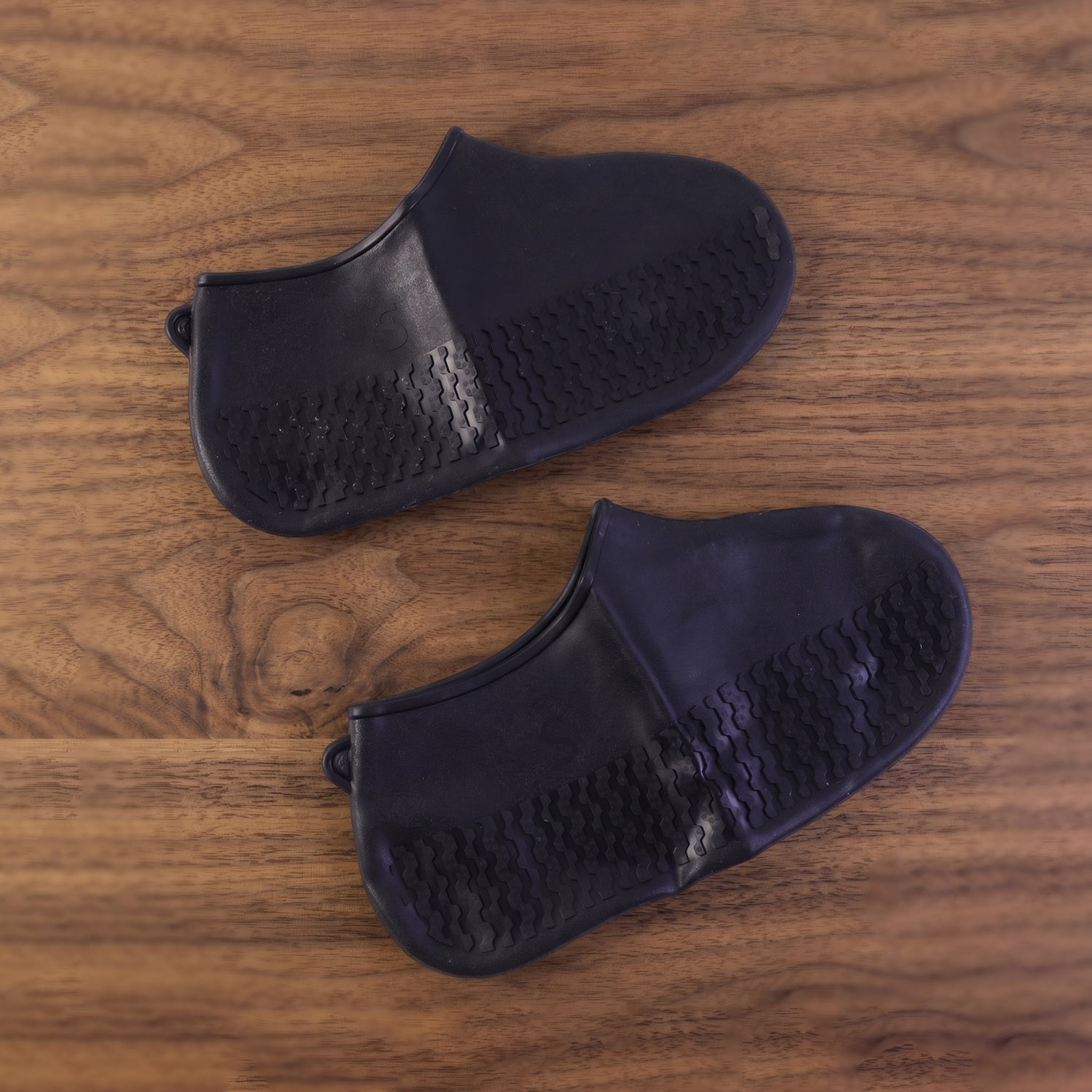 Black shoe cover white bg