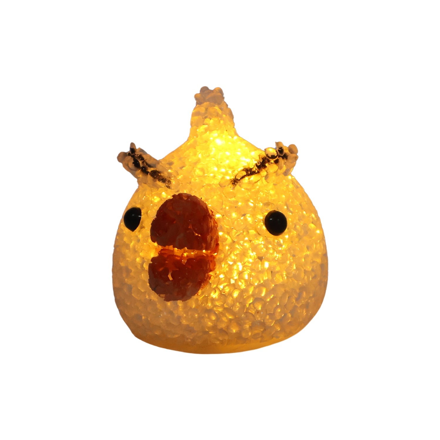 A glowing yellow chick-shaped night lamp with a red beak and black eyes on a white background.
