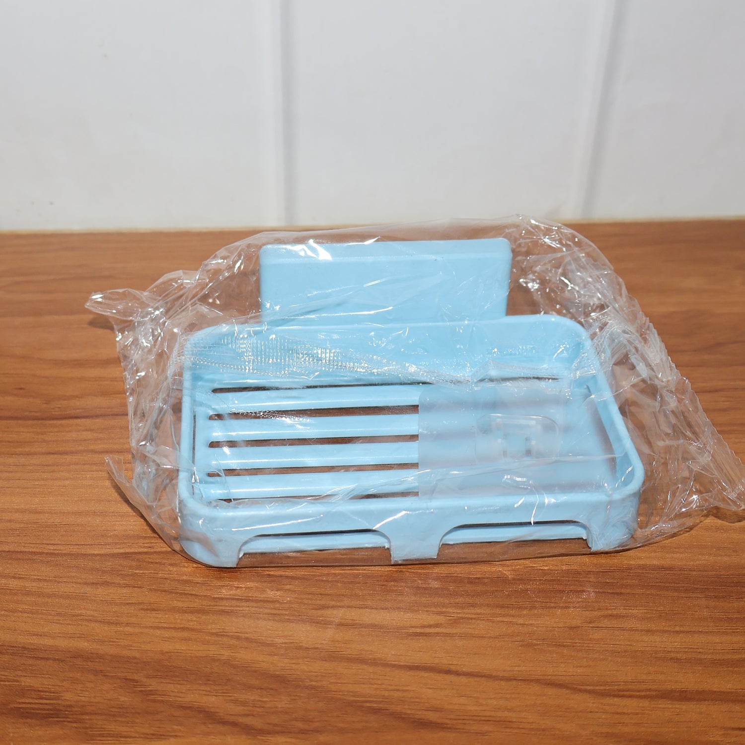 Soap dish mounted in bathroom showing usage