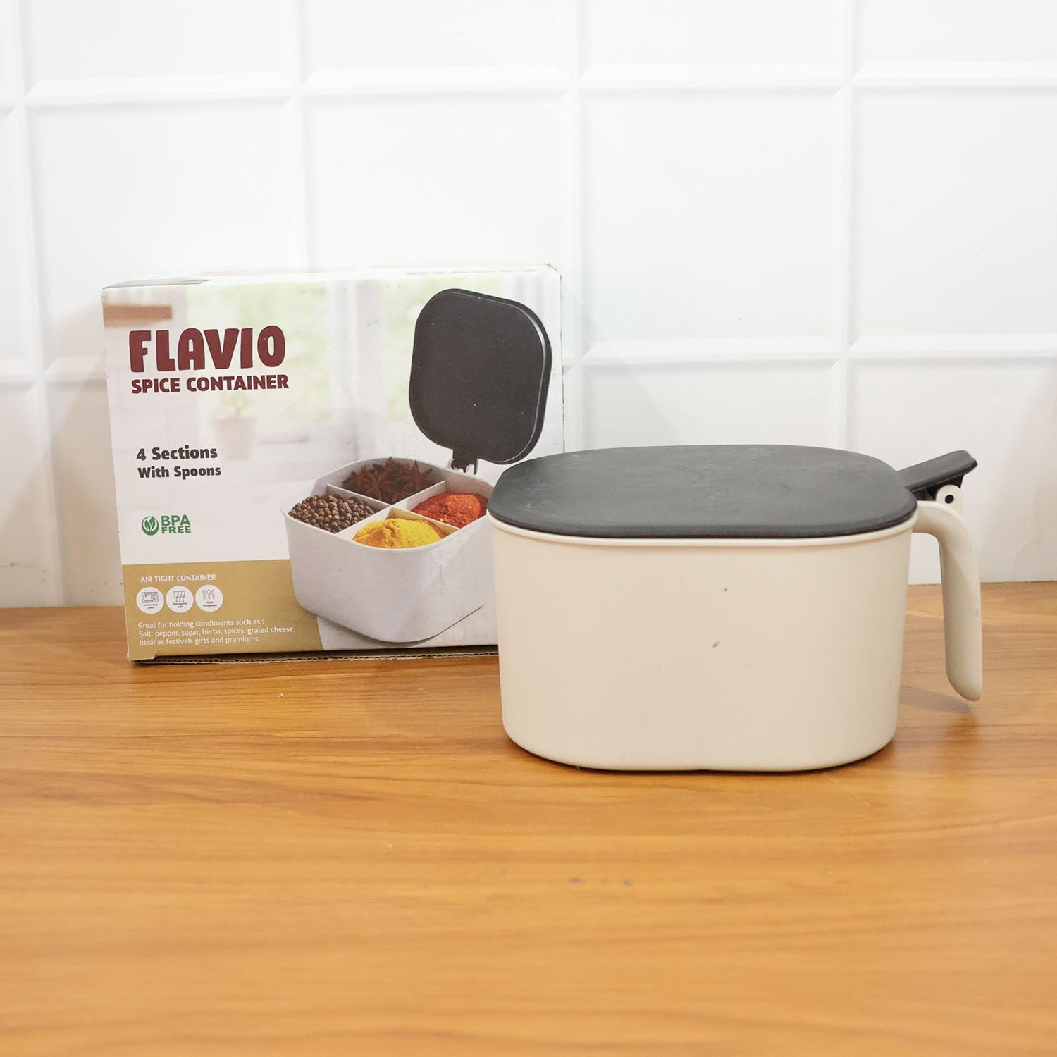 Masala box in use on a kitchen counter