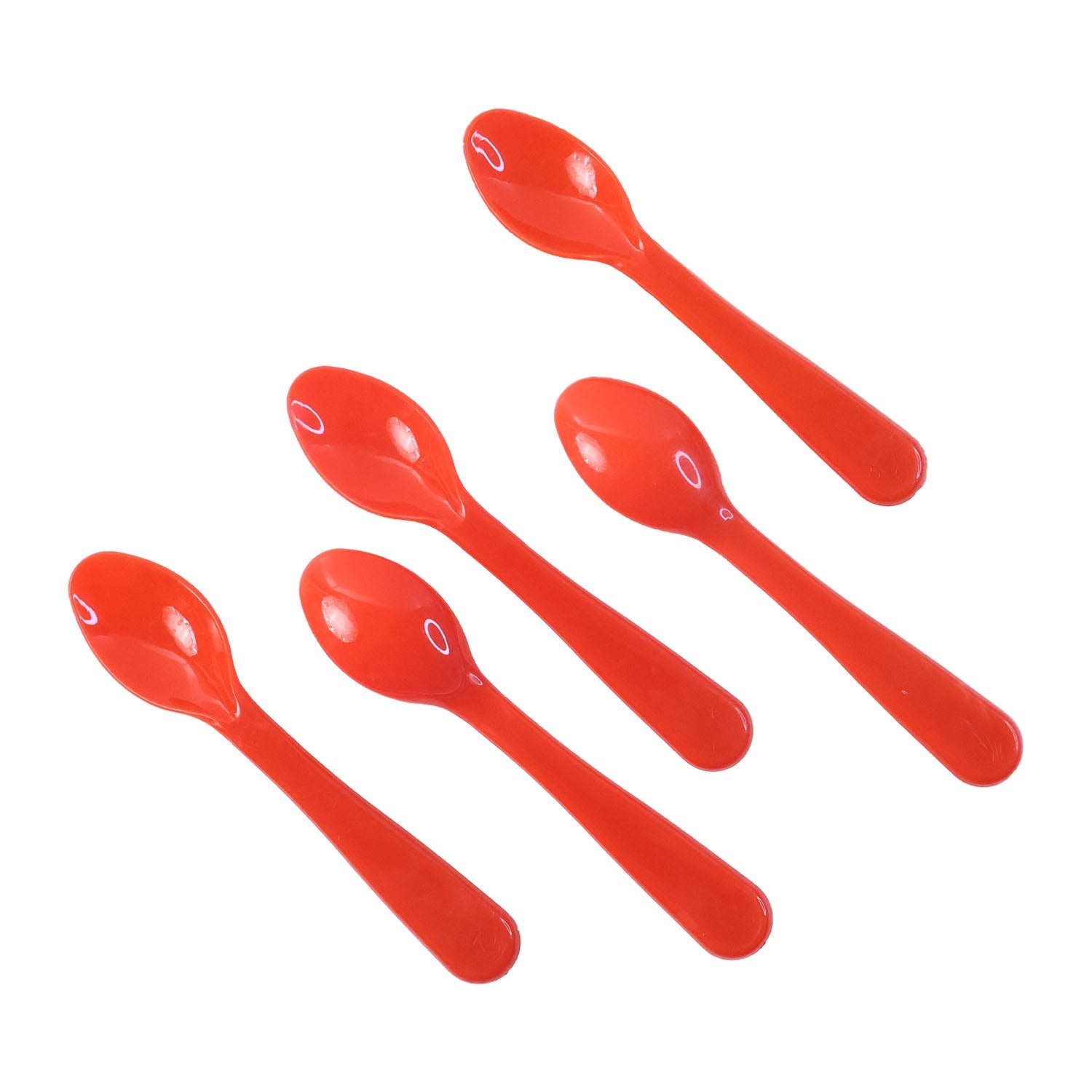 Hand using a white plastic spoon to serve food from a bowl
