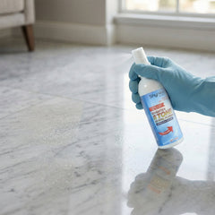 Stone stain remover cleaning process on marble surface