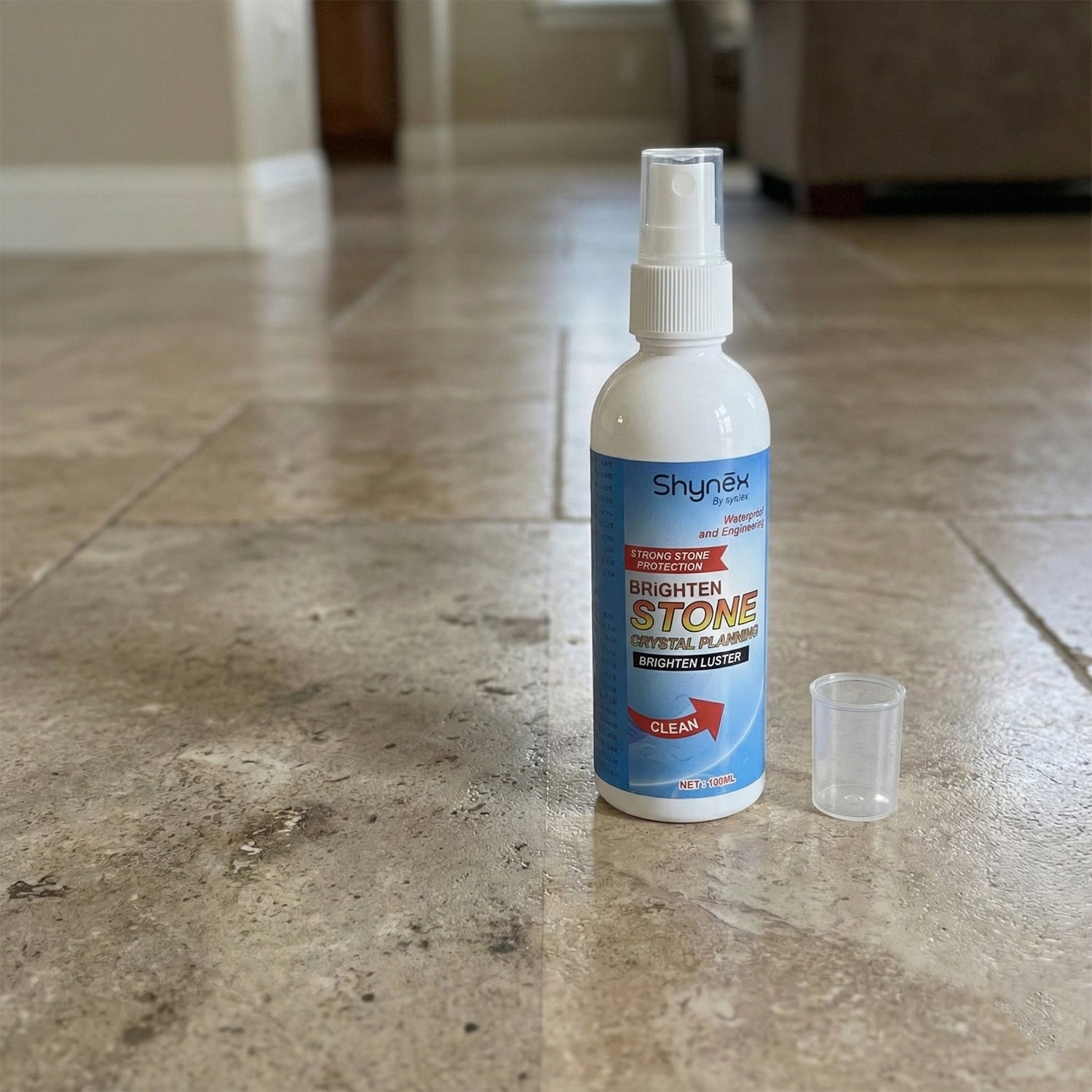 Stone stain remover application on kitchen stone slab
