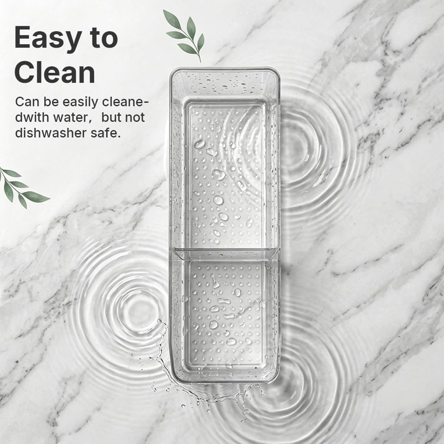 Clear plastic organizer with water droplets and ripples on a white marble surface, illustrating its easy-to-clean feature.